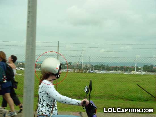 yea-its-a-woman-lolcaption-funny-fail-pics-motorbike-helmet-backwards.jpg