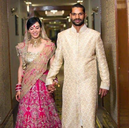 Sikhar dhawan and his wife.jpg